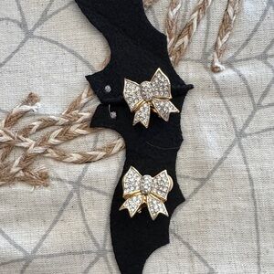 Vintage Nina Ricci Gold and Silver Bow Earrings. These are mint condition.